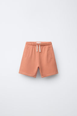 BERMUDA FELPA GARMENT DYE LOGO / Naranja