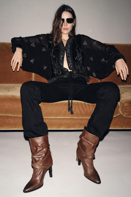 LEATHER ANKLE BOOTS WITH FRINGING