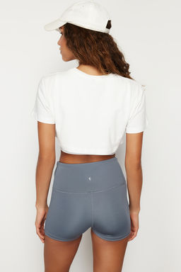 Beyaz %100 Pamuklu 2 Katmanl? Reflektor Bask?l? Crop Orme Spor T-Shirt THMSS24TS00001