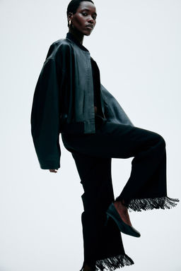 Pantalon con acabado desflecado