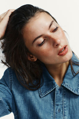 SHIRT-STYLE BODYSUIT WITH SHOULDER PADS