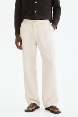 Pantal?n texturizado Relaxed Fit - H&m фото 7