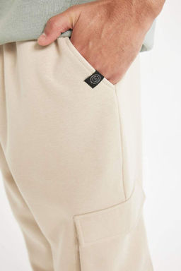 Обычные спортивные штаны для бега с карманами-карго, кружевной талией и эластичной резинкой по ноге - Defacto фото 5