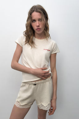 CAMISETA MANGA RANGL?N TEXTO / Crudo