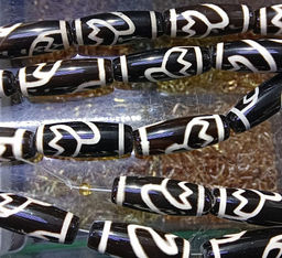 Бусина Дзи уп-2шт с Лотосом символизирует процветание и удачу