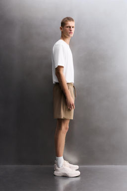 PANTALONES CORTOS T?CNICOS TRAINING / Marr?n claro