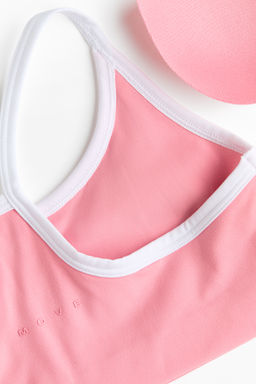 Crop top acolchado de deporte con SoftMove - H&m фото 3