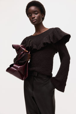 Top en punto texturizado con volantes - H&m фото 3