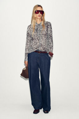 ANIMAL PRINT BLOUSE WITH BOW