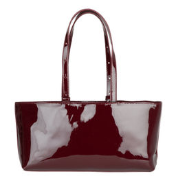 Женская лаковая сумка