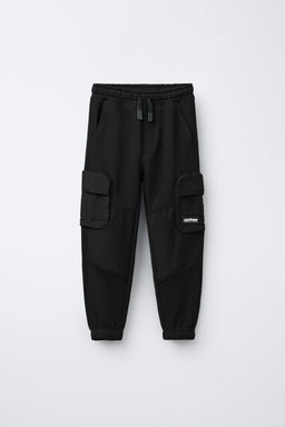 JOGGING TROUSERS WITH CARGO POCKETS