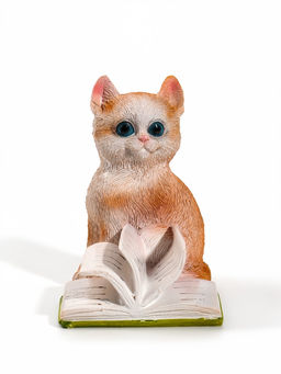 Сувенир полистоун "Котёнок листает книгу" рыжий 10х7,2х10,5 см