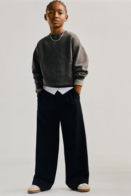 TROUSERS WITH TURN-UP WAIST