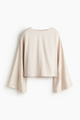 Blusa con hombreras