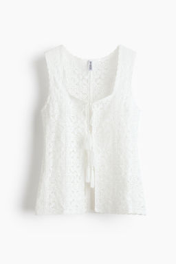 Top en punto pointelle con lazadas