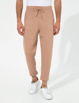 Бежевые зауженные брюки из эластичного трикотажа - Cacharel фото 2