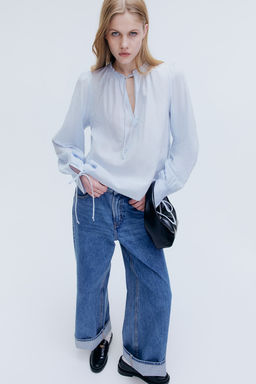 Blusa de algodon con lazadas