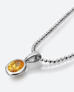 Diamantaire. Кулон с кубическим цирконом желтого цвета, овальной формы