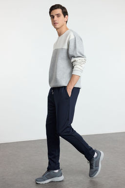 TRENDYOL MAN Ac?k Lacivert Jogger Fit Beli Bagc?kl? Dokulu Kumas Pantolon TMNSS24PL00027 - Trendyolmilla фото 6