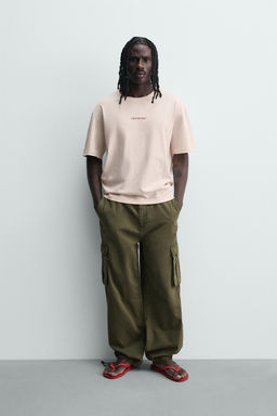 CAMISETA RELAXED FIT TEXTOS ESTAMPADOS / Rosa