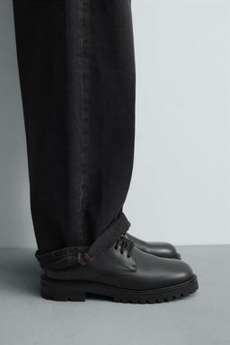 LEATHER LACE-UP BOOTS