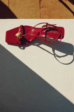 HEELED SANDALS WITH METAL DETAIL