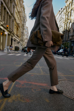 BUTTONED HEM TROUSERS
