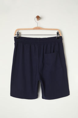 Basic Lacivert Regular/Normal Kesim Orta Boy Bagc?kl? Dokulu K?r?smaz Ottoman Sort TMNSS23SR00039