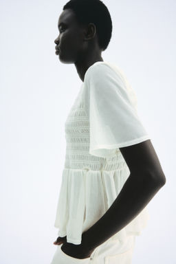 Top nido de abeja con peplum - H&m фото 8