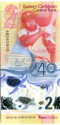 Банкнота 2 доллара 2023 года Восточные Карибы- 40 лет Банку Восточных карибов