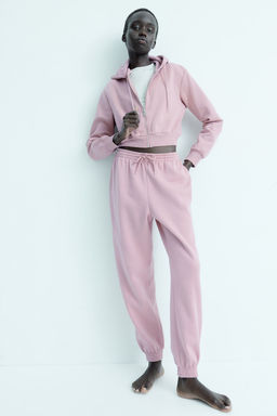 Chaqueta sudadera cropped con capucha y cremallera