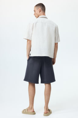 Pantal?n corto efecto neopreno Relaxed Fit - H&m фото 8