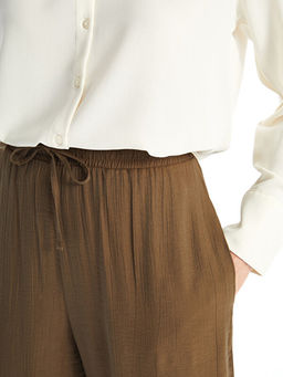 Beli Lastikli Rahat Kal?p Kad?n Pantolon