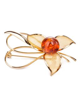 Красивая позолоченная брошь, украшенная натуральным балтийским коньячным янтарём Beoluna