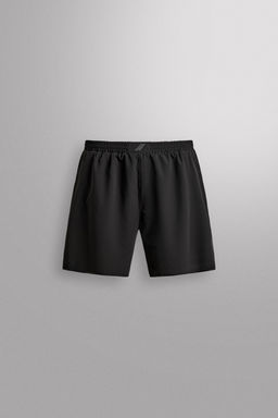PERFORATED COMBI SHORTS