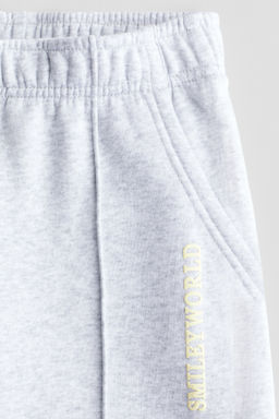 Joggers en tejido sudadera con motivos estampados - H&m фото 5