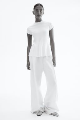 Top en punto fino con peplum - H&m фото 4