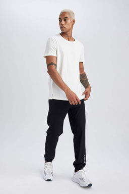 DeFactoFit Облегающие тканые спортивные штаны для бега с двумя карманами  фото 2