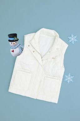 K_z _ocuk Krem Yelek Sepette S_rpriz _ndirim