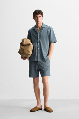 TEXTURED RELAXED FIT BERMUDA SHORTS