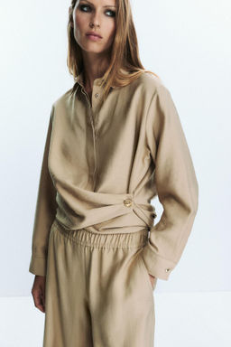 WIDE-LEG TROUSERS WITH ELASTIC WAIST