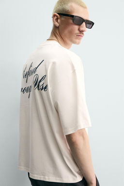 CAMISETA RELAXED FIT TEXTOS ESTAMPADOS / Blanco