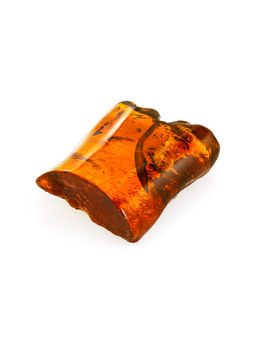 Плоский сувенирный кусочек натурального янтаря коньячного цвета