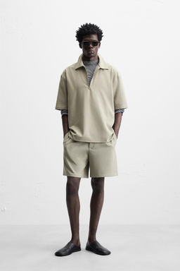 TECHNICAL ZIP-UP POLO SHIRT