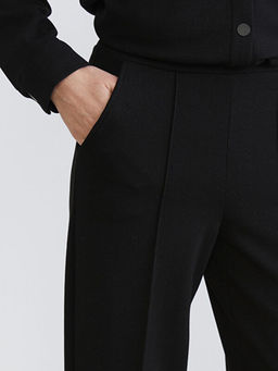 Beli Lastikli Parlak Dokulu Kad?n Pantolon