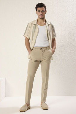 Ta_ Slim Fit Beli Ba_lama Detayl_ Lastikli Kuma_ Dokuma Pantolon TMNAW25PL00027