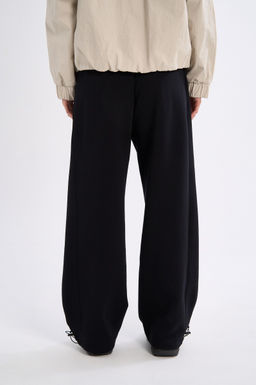Брюки трикотажные Черный TRN Knit Track Pants - Anta фото 6
