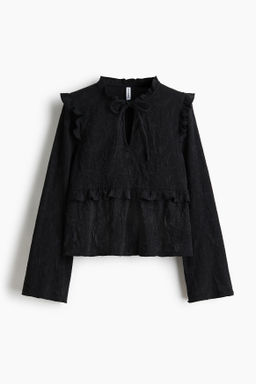 Blusa en punto jacquard
