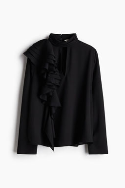 Blusa con detalle de volante