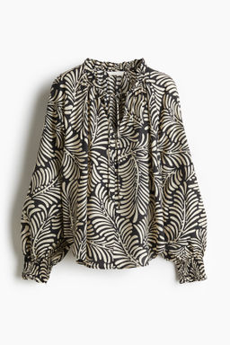 Blusa oversize con lazada
